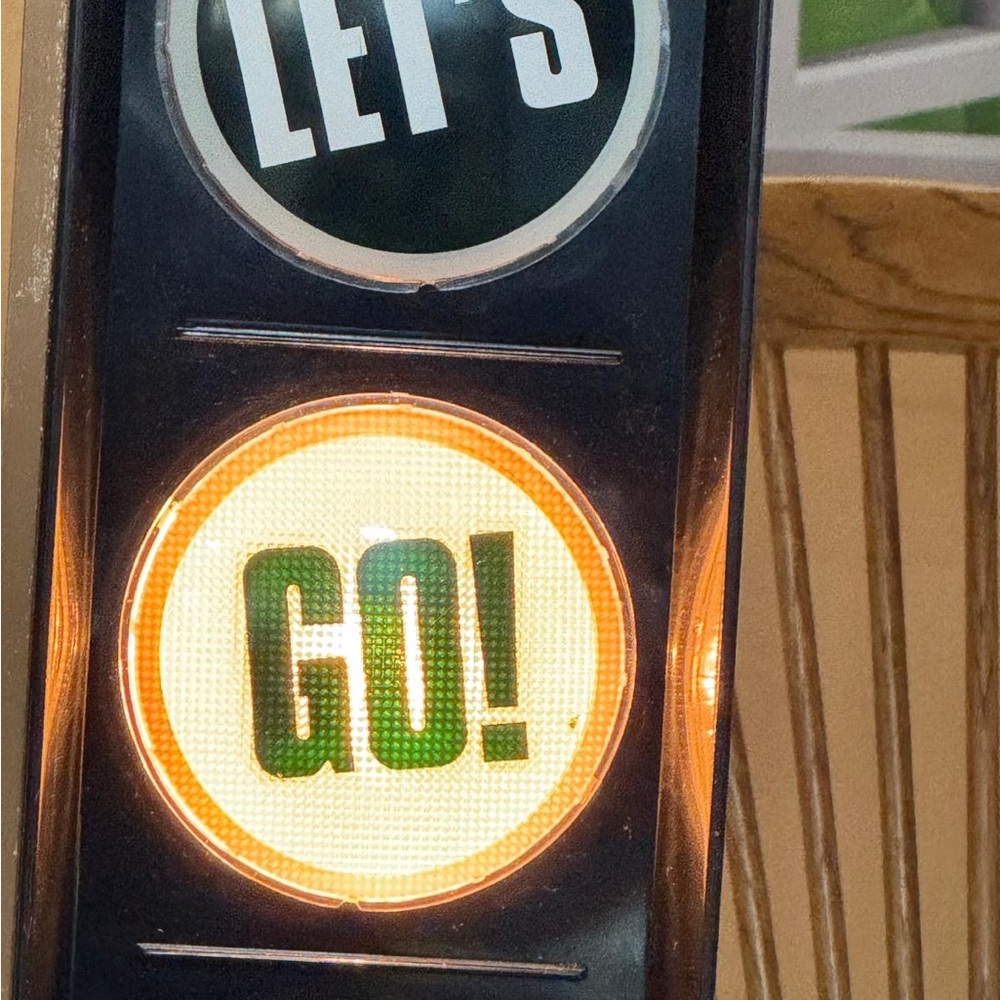 Vintage Traffic Light Sign with 'GO!'